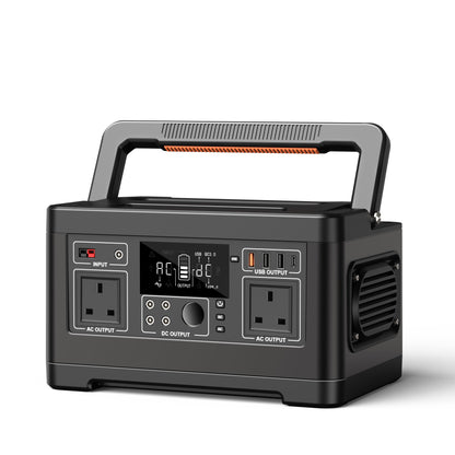 Black portable power station with multiple outlets and display on a white background